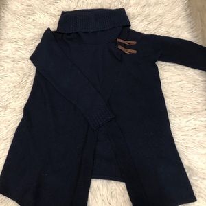 Dark blue turtle neck.